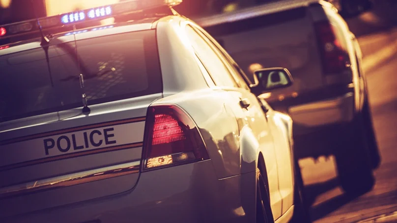 police pulling over a truck