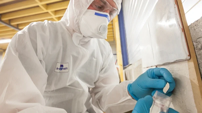 asbestos surveyor taking samples