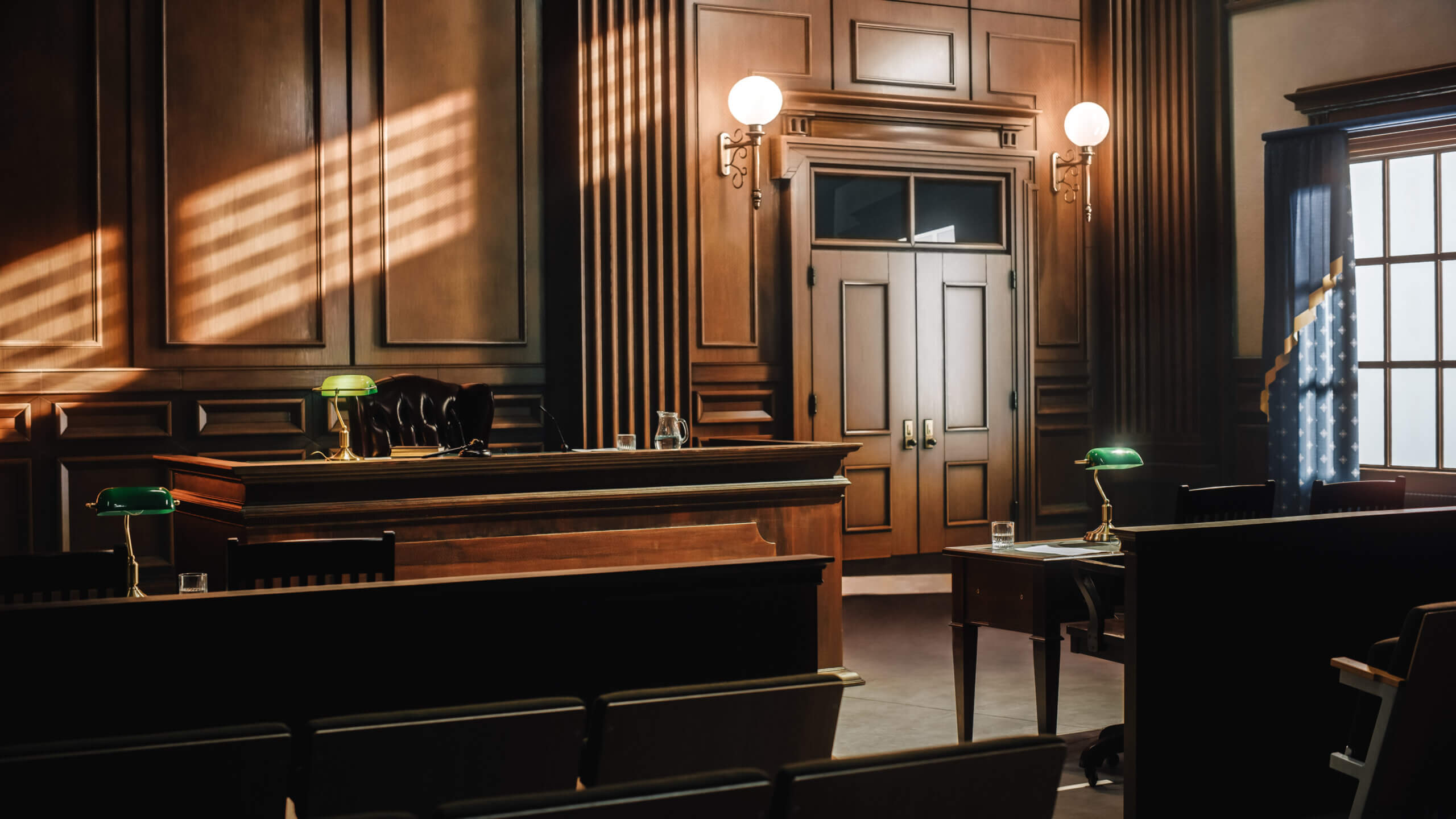 A courtroom scene featuring a judge presiding over a wooden bench, symbolizing justice and legal proceedings